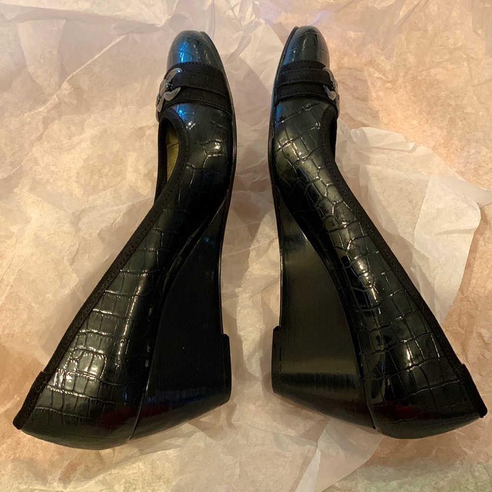 Like New Bandolino Wedge shoes in gorgeous Black.  In original box.